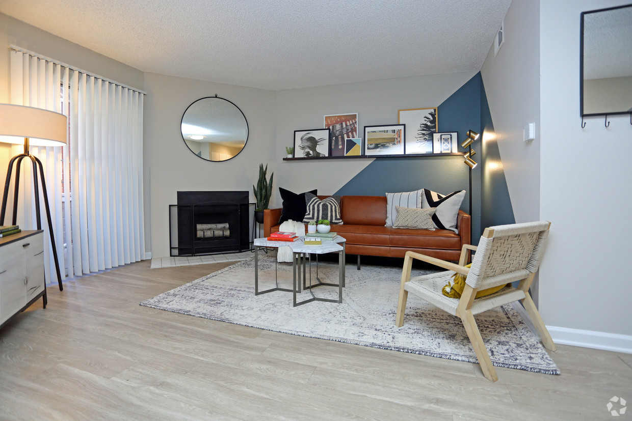 Living room with fire place and large windows